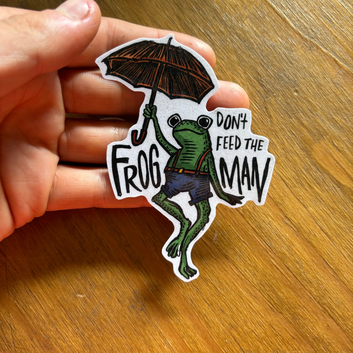 Don't feed the frogman sticker