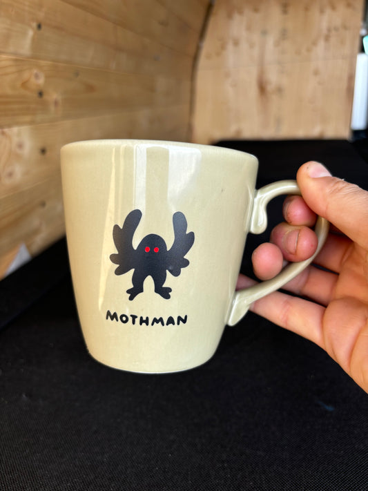 Mothman upcycled mug - red eyes - greenish