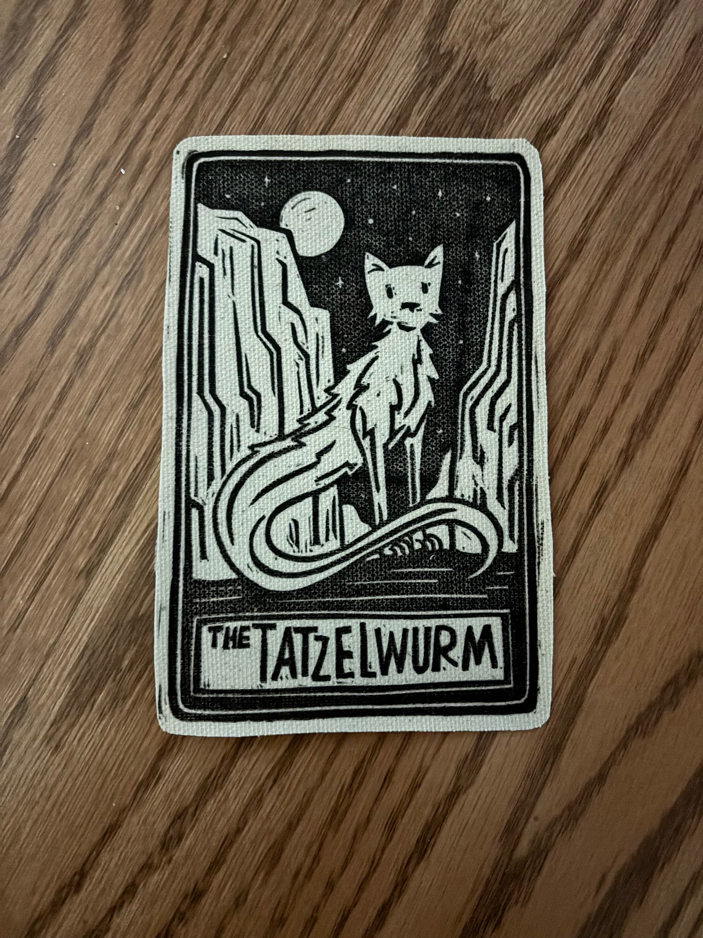 Tatzelwurm sew on patch
