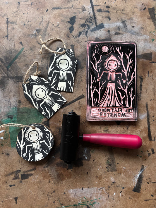 Flatwood monster hand printed ornaments