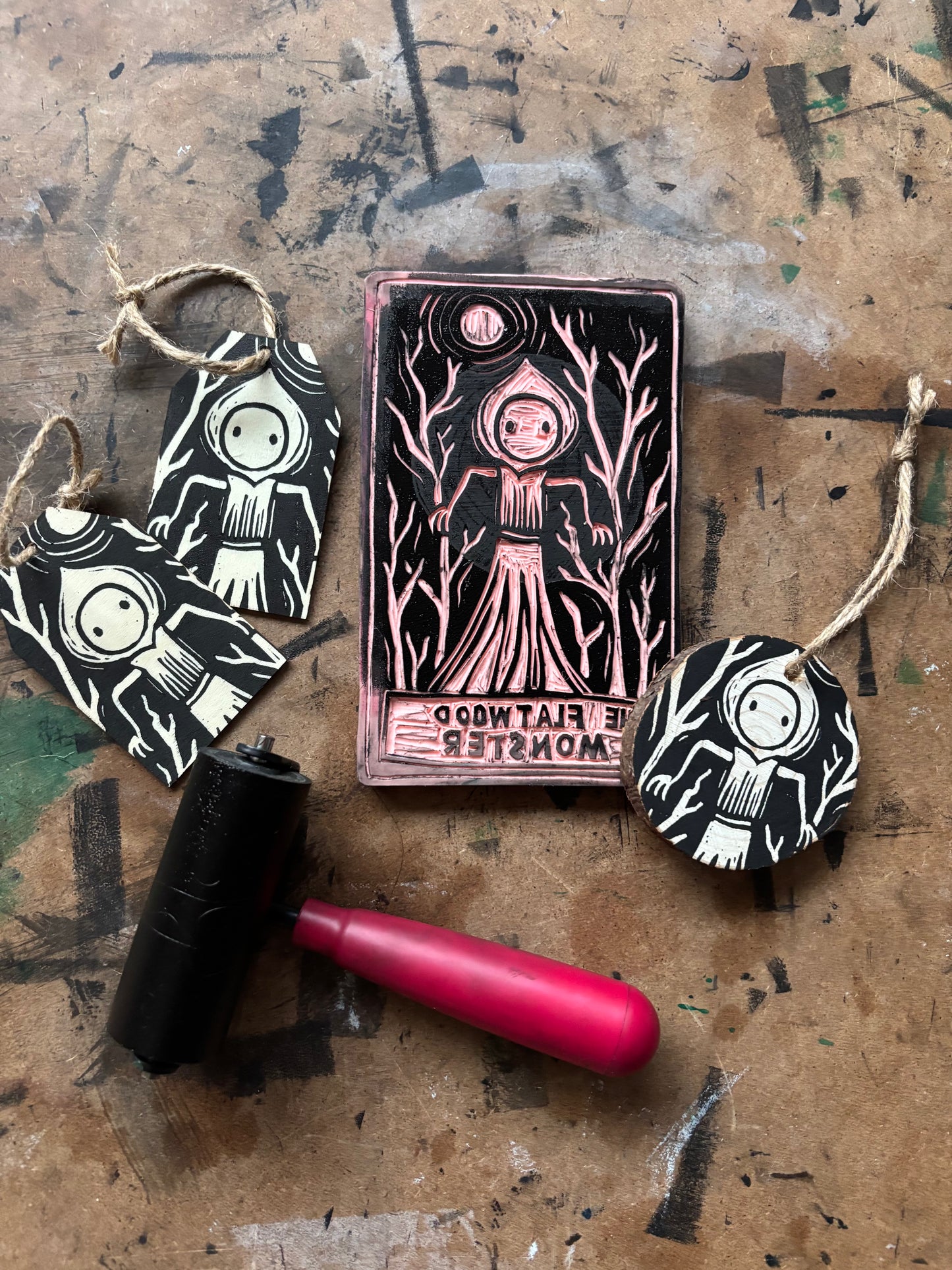 Flatwood monster hand printed ornaments