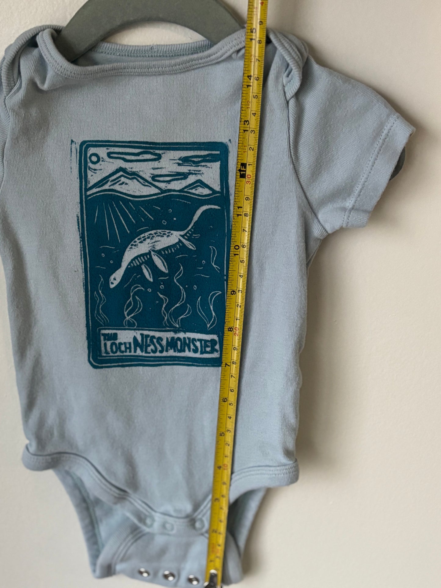 6-12M - Nessie onesie